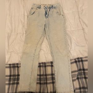 Selling these light washed jeans fit great, comfortable